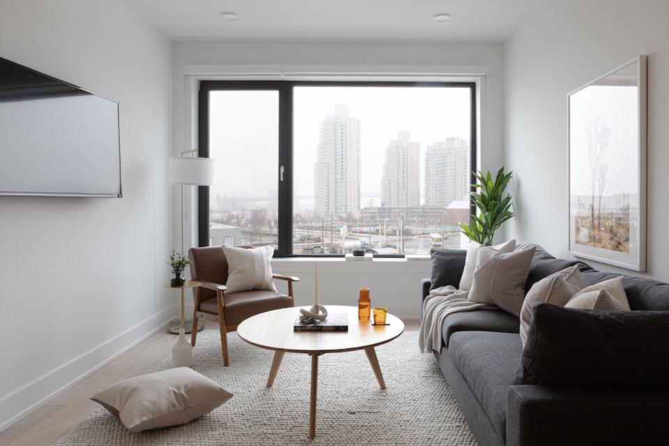 A living room with a view of Philadelphia