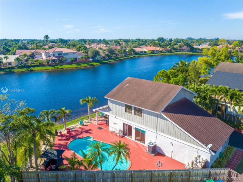 A house withal the Miami river with new tile shingles